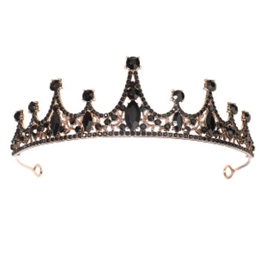 Detailed close-up of vintage black rhinestone bridal tiara with antique gold alloy base