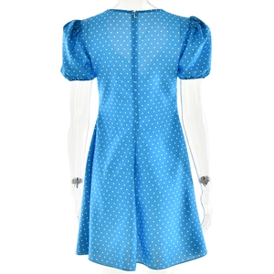 Detail of blue polka dot dress showing the back view with an invisible zipper closure