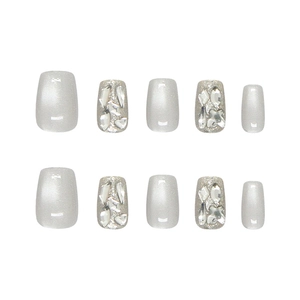 Silver cat eye press-on nails with sparkling rhinestones and short square shape