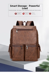 Close-up of brown PU leather men's backpack showing textured finish and multiple zipper pockets