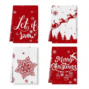 Set of four red and white Christmas microfiber kitchen towels with festive holiday prints