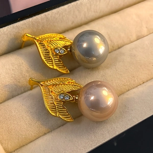 Vintage leaf pearl stud earrings with diamonds in grey and champagne tones