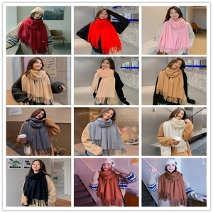 Detailed grid view showcasing 12 vibrant colors of soft knitted fringe winter scarves