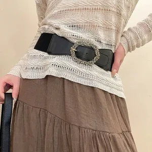 Ceinture large élastique vintage avec boucle en bronze et détails en similicuir noir