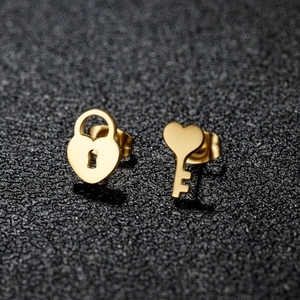Minimalist gold asymmetric heart lock and key stud earrings in stainless steel