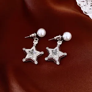 Elegant silver star pendant earrings with white pearl and sparkling cubic zirconia stones