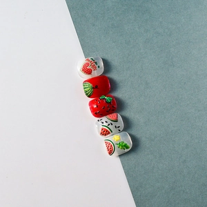 3D embossed fruit nail stickers featuring vibrant red watermelon and strawberry designs