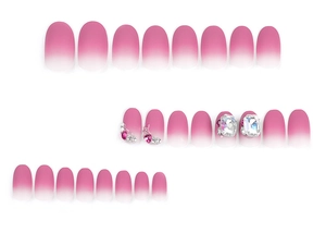 Detail of 24pcs pink ombre oval press-on nails with luxury rhinestone and gem embellishments
