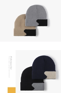 Detailed view of thick vertical stripe knit texture and color block patterns on beanie