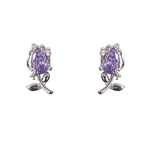 Minimalist tulip stud earrings with purple cubic zirconia and small accent diamonds