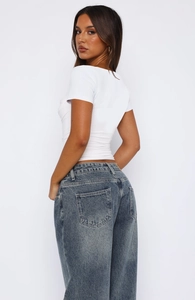 Detailed back view of a white short sleeve slim fit pleated T-shirt for women