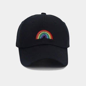 Detailed view of rainbow embroidery on black cotton twill baseball cap with neat stitching