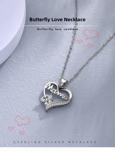 Detailed macro view of sterling silver heart necklace with Mama text and butterfly