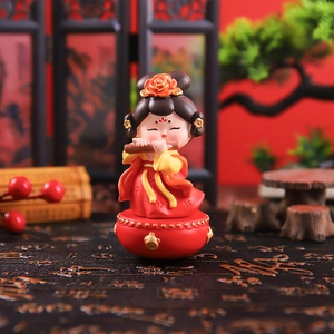Traditional Chinese girl figurine playing flute on round base with oriental background