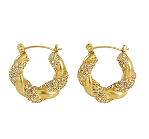 Close-up of 18K gold-plated twisted hoop earrings with sparkling crystal pavé details