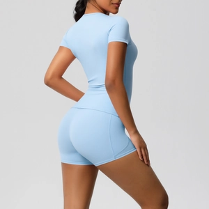Women's light blue yoga set with tight short sleeve T-shirt and slim fit athletic shorts