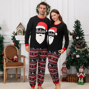 Christmas pajama set with Santa 'Believe' top and Fair Isle patterned trousers for family