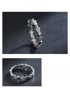 Detailed view of S925 sterling silver star ring with micro-pave zirconia settings