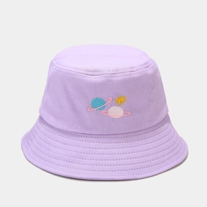 Detail of lavender cotton bucket hat with colorful planet and star embroidery work