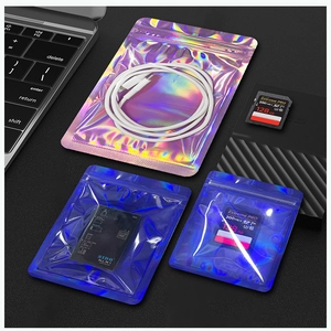 Detailed view of holographic ziplock bags in various sizes with electronic accessories