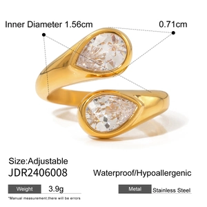 Detail view of gold-plated adjustable stainless steel ring with double pear-shaped stones