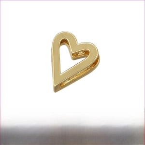 Detailed view of 7x8mm gold-plated brass hollow heart charm for DIY jewelry