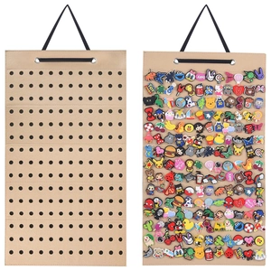 Macro detail of khaki felt hanging storage organizer for shoe charms with 180 slots