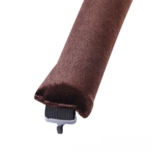 Close-up of brown velvet hair roller with black elastic strap and durable metal hook