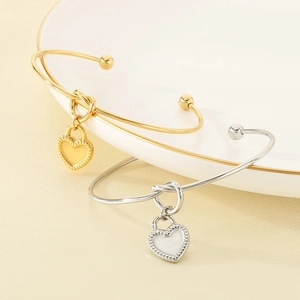 Minimalist stainless steel knot bracelets with heart charms in gold and silver finish