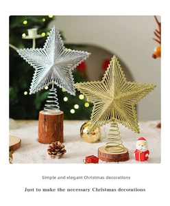 Close-up of gold and silver wire-woven hollow Christmas tree star toppers with glitter texture