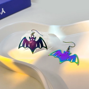 Iridescent bat drop earrings with rainbow gradient finish for Halloween style
