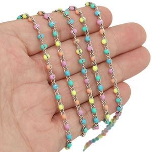 Colorful enamel bead stainless steel chain held by hand for DIY jewelry making