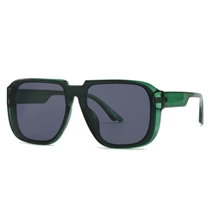 Green transparent oversized square sunglasses with gray lenses in 45-degree side view