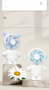 Close-up of portable cat mini fan with astronaut design and quiet brushless motor