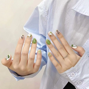 Hand-painted Dragon Boat Festival press-on nails with cute zongzi and bamboo leaf art