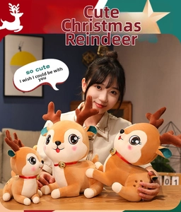 Three plush Christmas reindeer toys in various sizes with golden bells and red collars