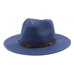 Detail view of navy straw fedora hat with brown leather band and metal buckle accent
