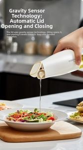 Detail of automatic gravity lid opening while pouring oil on salad with one hand
