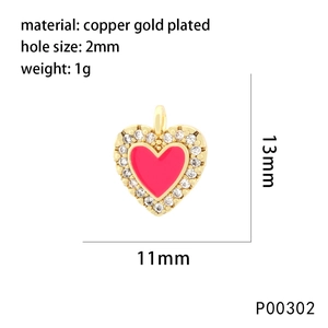 Detailed size view of red enamel heart pendant with 18K gold plating and cubic zirconia