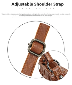 Detail of adjustable litchi texture leather strap with dark grey metal lobster clasp