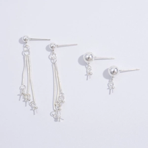 Detailed view of S925 silver earring posts with long tassel snake chains and ball studs