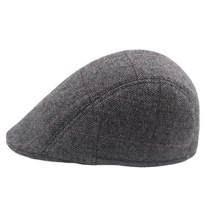 Men's herringbone tweed flat cap in dark grey with red windowpane check patterns