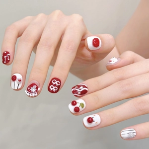 Faux ongles faits main motif bonhomme de neige et renne 3D de Noël en rouge et blanc