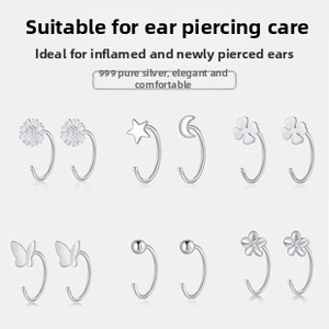 Set of six pairs of S999 sterling silver earrings featuring butterfly and star shapes
