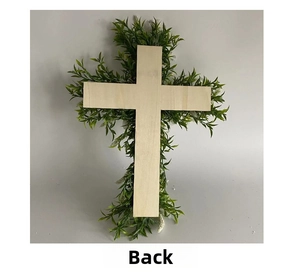 Detailed back view of a wooden cross Easter wreath with artificial green leaves