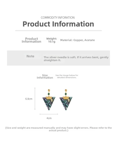 Detailed view of vintage triangle earrings with green marble acetate and golden metal studs