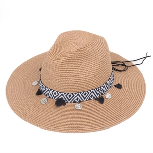 Brown straw fedora hat with bohemian coin tassels and geometric pattern band