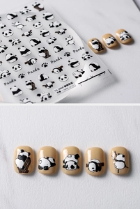 Close-up of 3D embossed lazy panda nail stickers with cute bamboo and paw print details