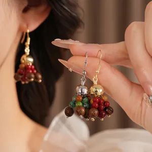 Bohemian dangle earrings with wood beads and glass tassels in a retro ethnic style