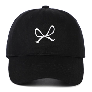 Classic black cotton baseball cap with white bow embroidery and adjustable soft top design